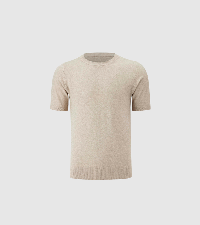 Beige short-sleeve sweater on a light gray background