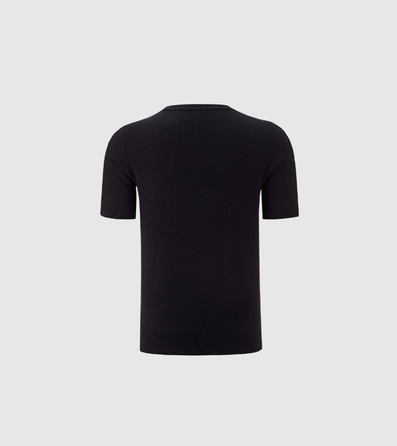 Black t-shirt on a light gray background
